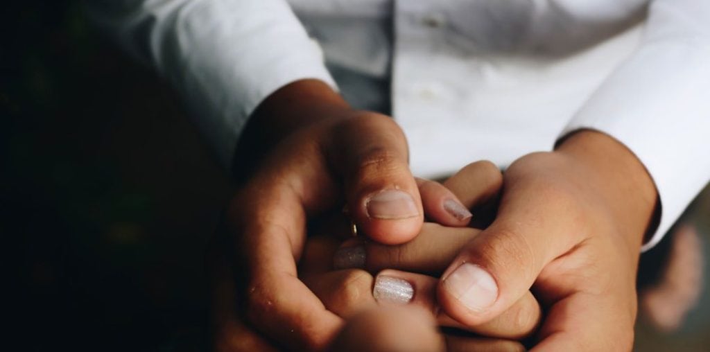 person holding hands
